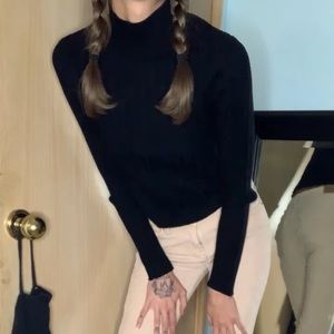 Black ripped turtleneck